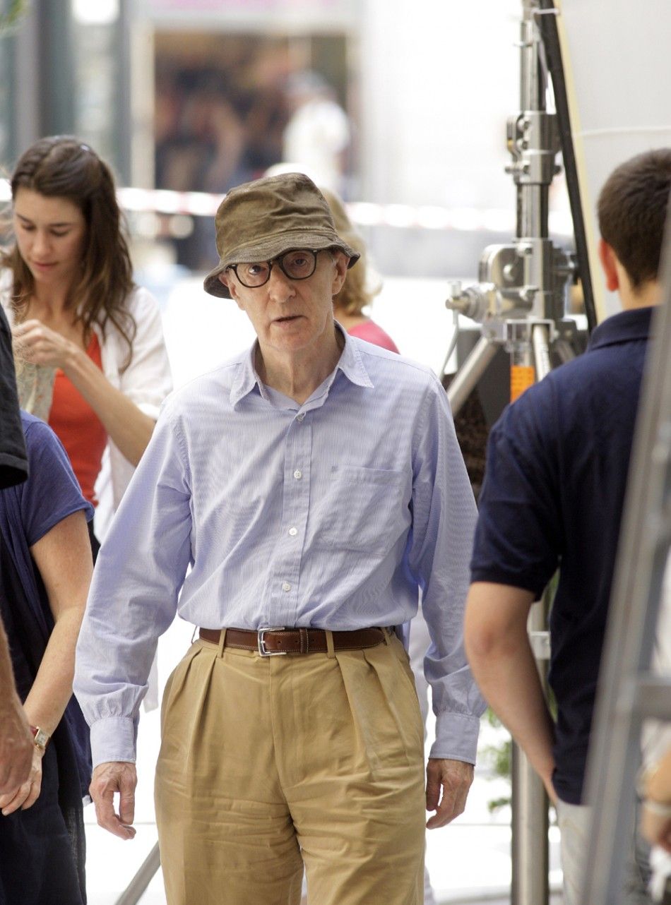 U.S. director Woody Allen walks during the shooting of his next movie