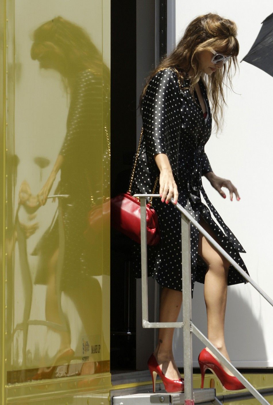 Spanish actress Penelope Cruz leaves the dressing room