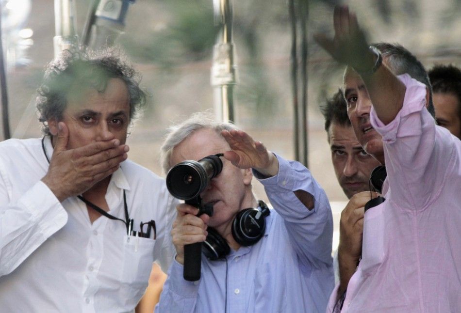 U.S. director Woody Allen C gestures during the filming of his new movie