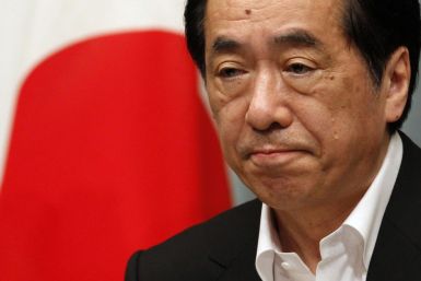 Japan&#039;s Prime Minister Naoto Kan attends a news conference at his official residence in Tokyo