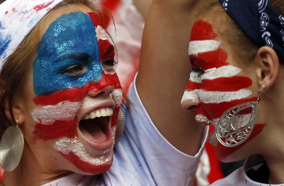 The U.S. fans cheer before the Womens World Cup semi-final soccer match against France in Monchengladbach 
