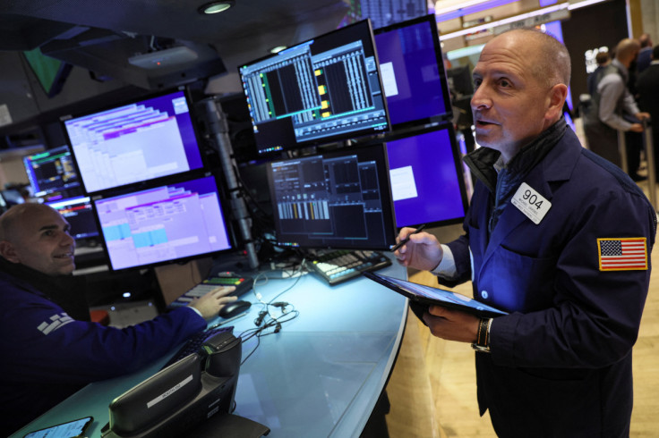 Traders work on the floor of the NYSE in New York City