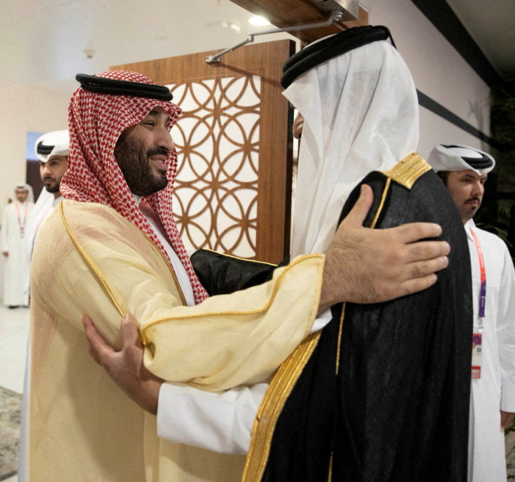 Saudi Arabia Crown Prince and Prime Minister Mohammed bin Salman is received by Qatari Emir Sheikh Tamim bin Hamad al-Thani on the sidelines of the World Cup in Doha