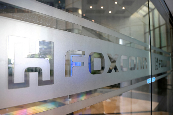 The Foxconn logo is seen on a glass door at its office building in Taipei,