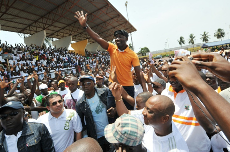 March 2010: Ble Goude, then head of President Gbagbo's youth wing, waves at a campaign rally