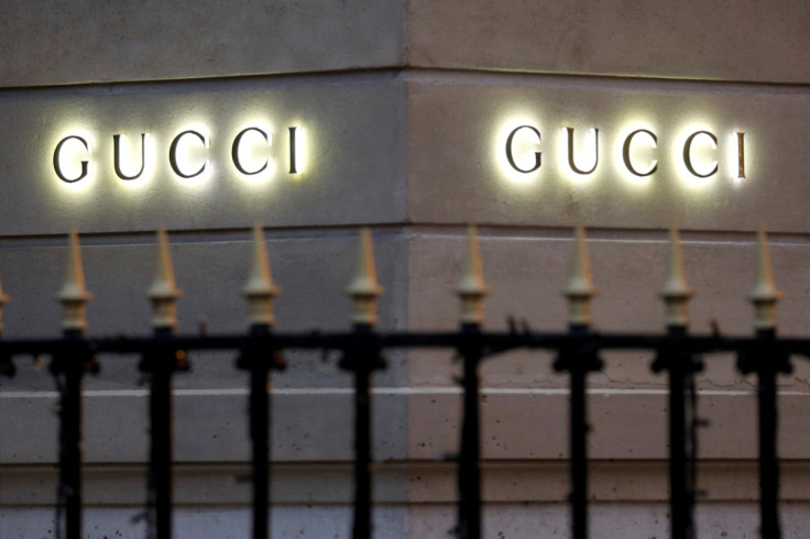 Gucci signs are seen outside a shop in Paris