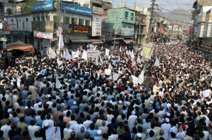 People take part in a protest a day after an attack on a school bus in Mingora, in the Swat District of Khyber Pakhtunkhwa in October.