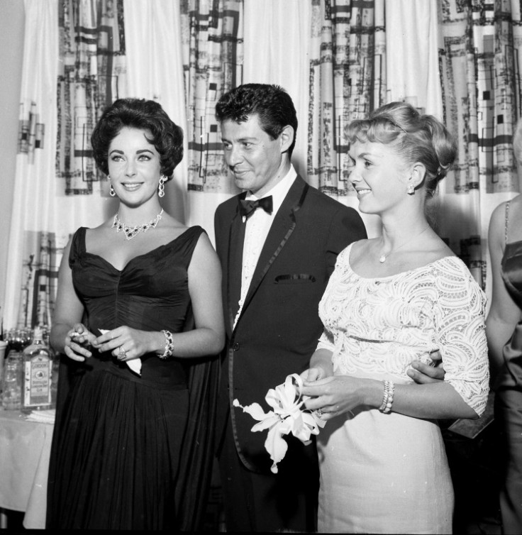 Taylor (L) was convinced she would not win the Oscar because she was accused of stealing her fourth husband Eddie Fisher (C) from Debbie Reynolds (R)