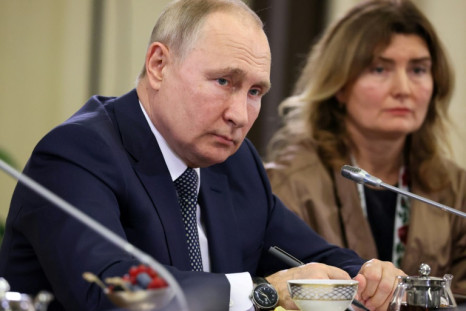 The carefully choreographed meeting took place at Vladimir Putin's residence