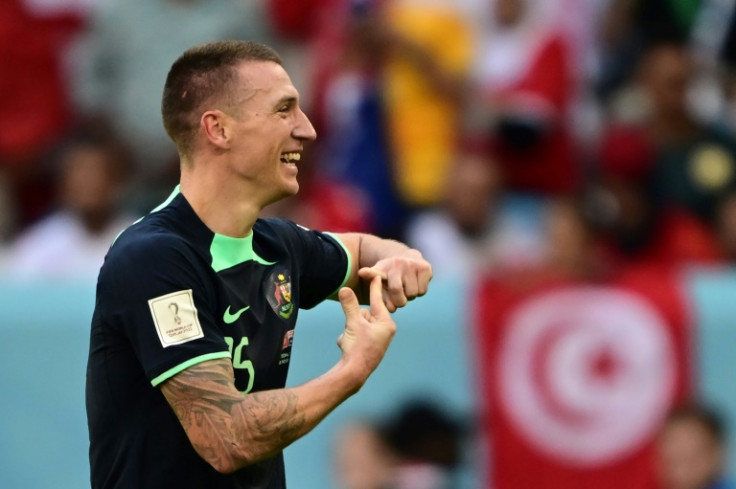 Australia's Mitchell Duke celebrates scoring against Tunisia at the World Cup in Qatar