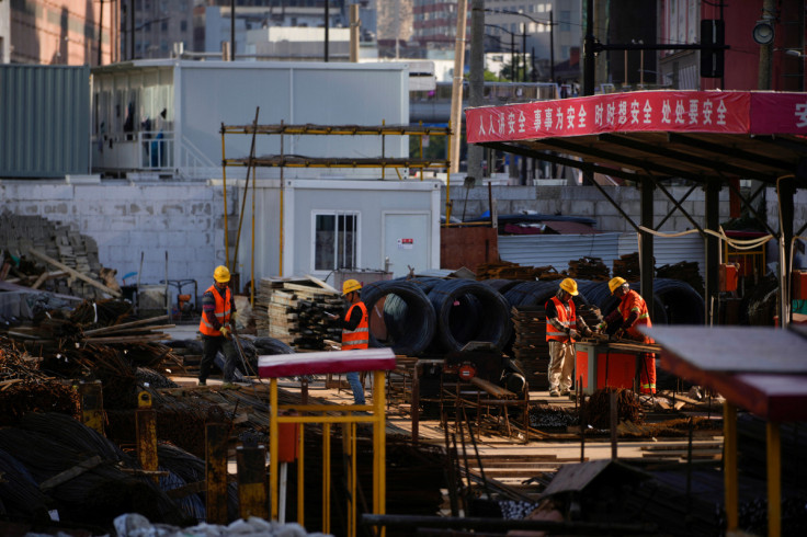 Workers work at a construction site, following the coronavirus disease (COVID-19) outbreak, in Shanghai