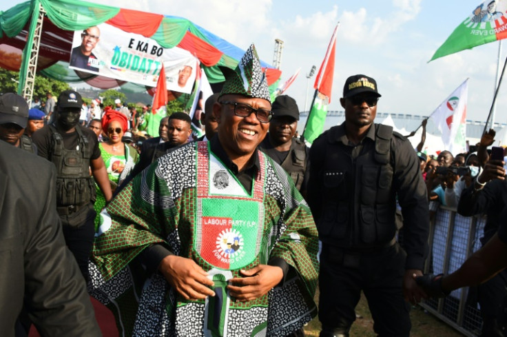 Labour Party's Presidential candidate Peter Obi (C) is appealing to many young Nigerians with his outsider message