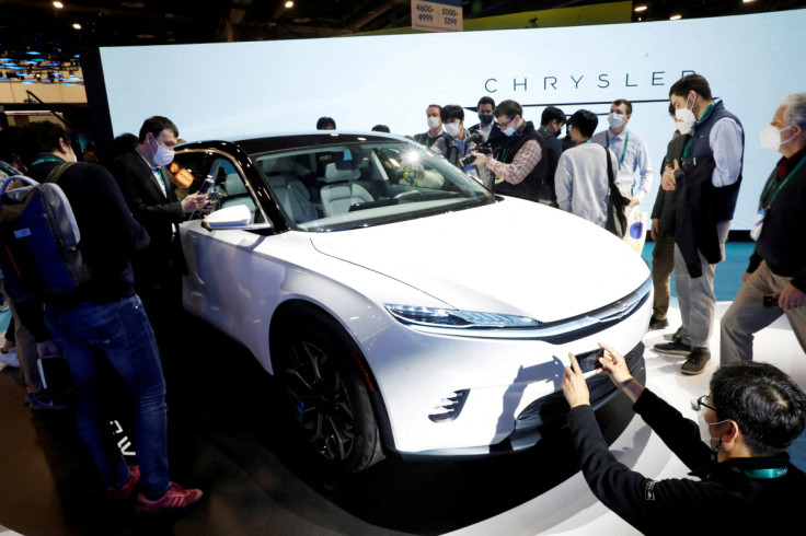 Attendees take a look at the Chrysler Airflow Concept electric vehicle