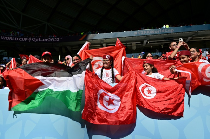Pro-Palestinian support is strong with fans such as these from Tunisia attending along with supporters of other World Cup participants Saudi Arabia and Morocco