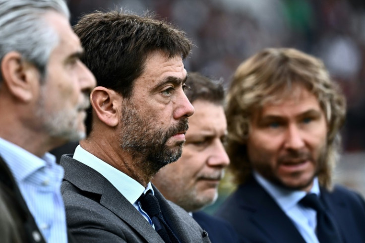 Juventus managing director Maurizio Arrivabene (R) will remain to oversee an interim as President Andrea Agnelli (C) vice-president Pavel Nedved (L) and entire board step down