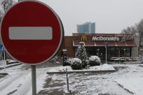 A view shows a closed McDonald's restaurant in Almaty