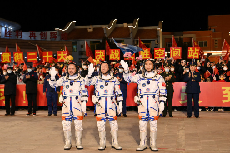 Astronauts Fei Junlong, Deng Qingming and Zhang Lu at Jiuquan Satellite Launch Center