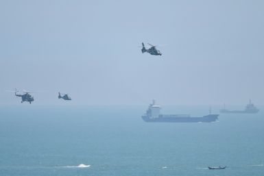 Chinese military helicopters fly past Pingtan island, one of mainland China's closest points to Taiwan, on August 4, 2022