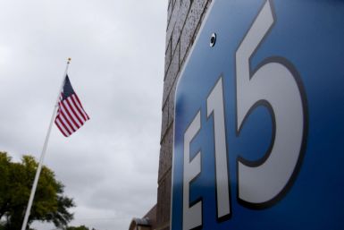 A sign advertising E15, a gasoline with 15 percent of ethanol, is seen at a gas station in Clive