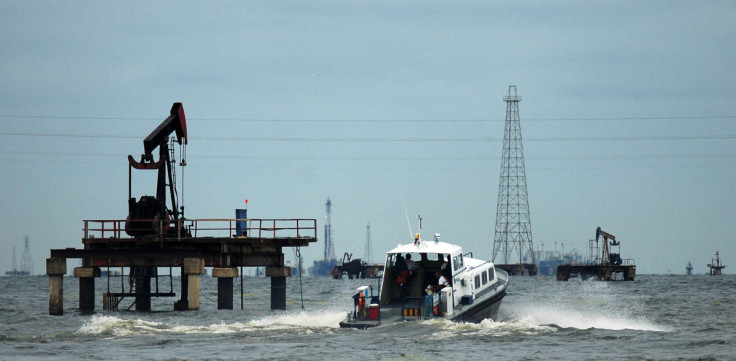 A boat with workers is seen at oil field at Venezuela's western Maracaibo lake