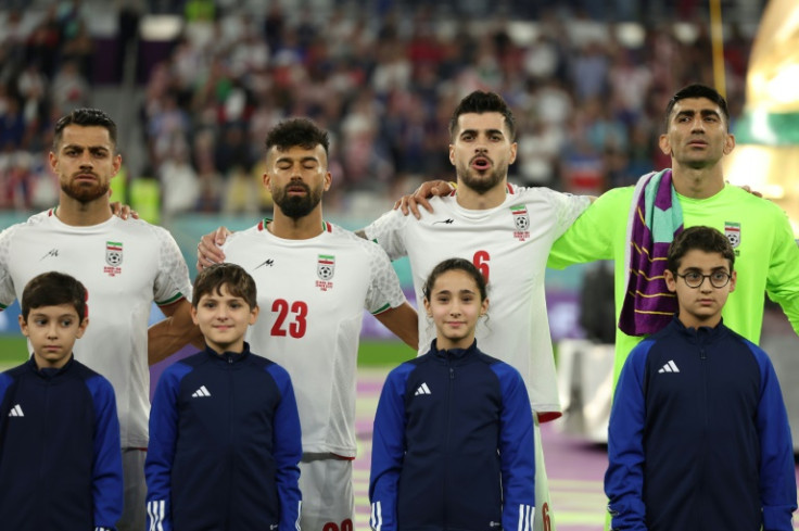 Iranian players during the playing of their national anthem ahead of the clash with the US on Tuesday night
