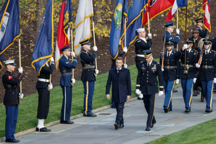French President Emmanuel Macron arrives for a wreath laying ceremony at the Tomb of the Unknown Soldier while visiting Arlington National Cemetery