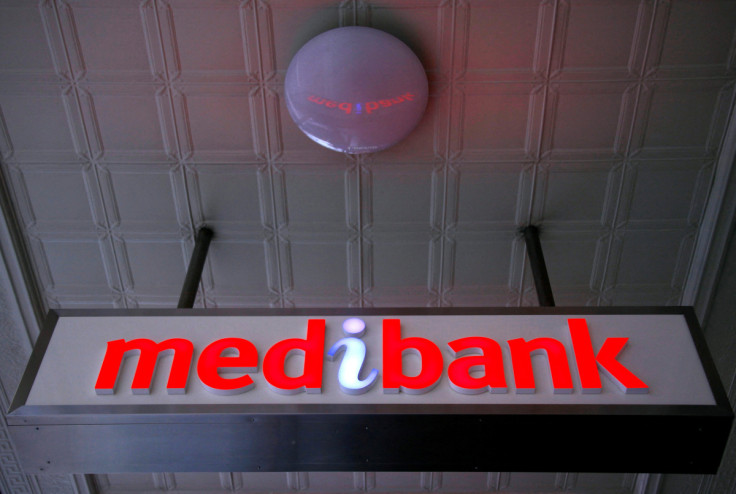 An illuminated sign is seen outside a branch of the Australian health insurer Medibank Private in Sydney