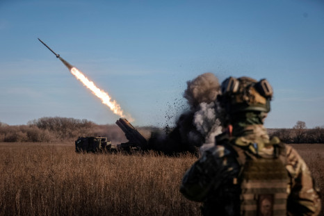 Ukrainian servicemen fire with a Bureviy multiple launch rocket system at a position in Donetsk region
