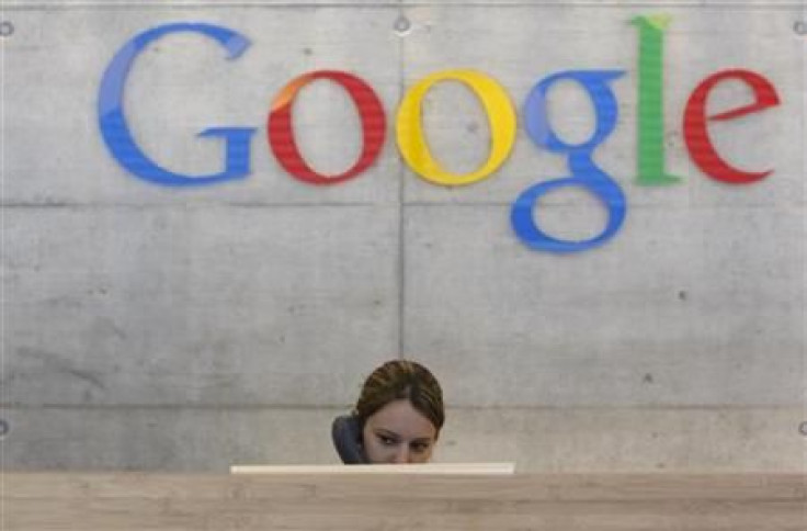 An employee answers phone calls at the switchboard of the Google office in Zurich