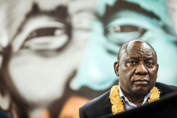 Ramaphosa, speaking in front of a portrait of Nelson Mandela at an ANC election campaign event in 2018