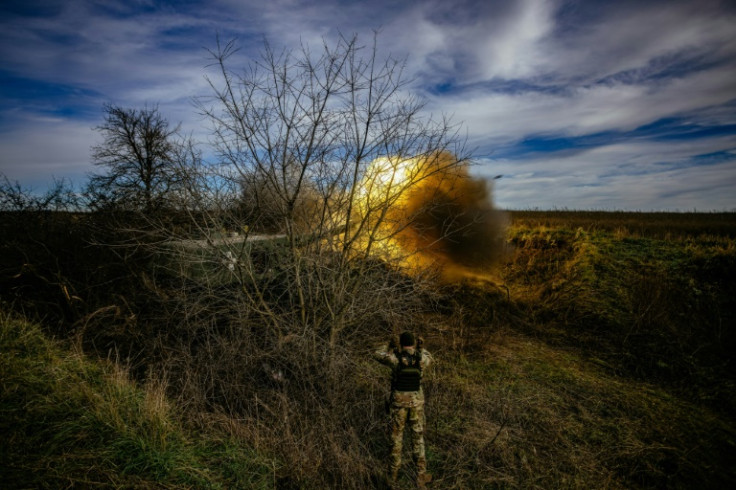 A self-propelled howitzer fires a shell towards Russian positions near an undisclosed frontline position in eastern Ukraine