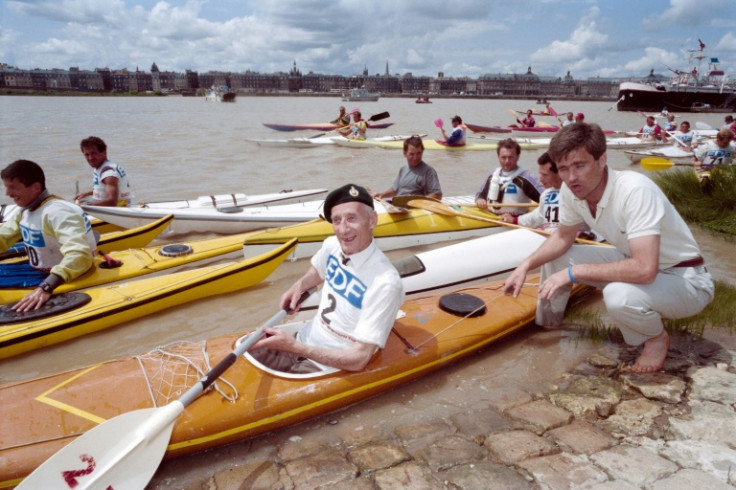 William Sparks (C), one of the only two survivors of the raid, returned for a visit in 1992