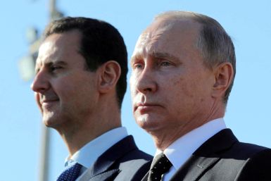 Russian President Putin and Syrian President Bashar al-Assad visit the Hmeymim air base in Latakia Province