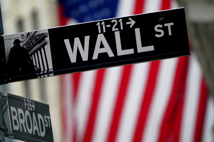 A Wall Street sign is pictured outside the New York Stock Exchange, in New York City