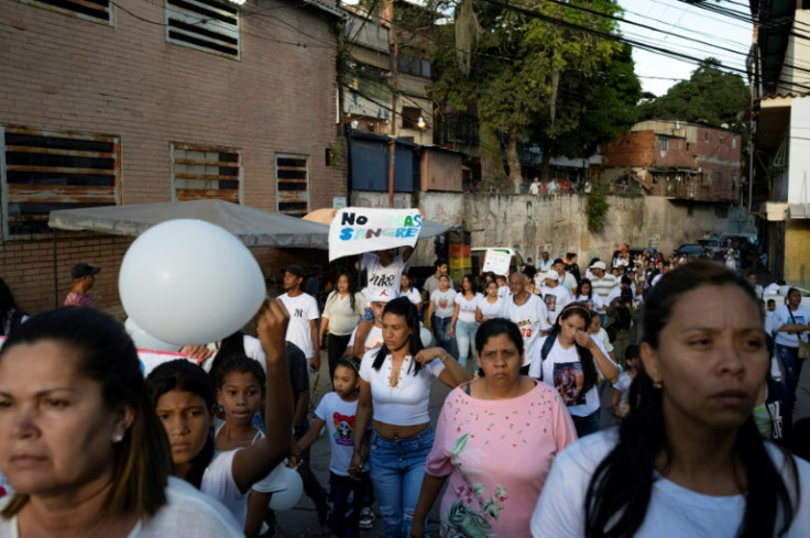 Caracas residents marched on November 20, 2022, to demand justice for the killing, allegedly by a policeman, of an 11-year-old girl shot as she slept; such police-involved killings are reportedly on the rise