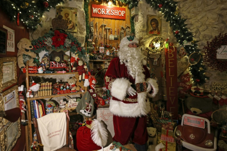 Issa Kassissieh transformed the ground floor of his 700-year-old home into a grotto, complete with candy, mulled wine and a chance to sit on Santa's lap