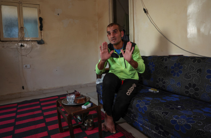Unemployed Lebanese Hussein Hamadeh gestures as he speaks during an interview with Reuters, in Beirut