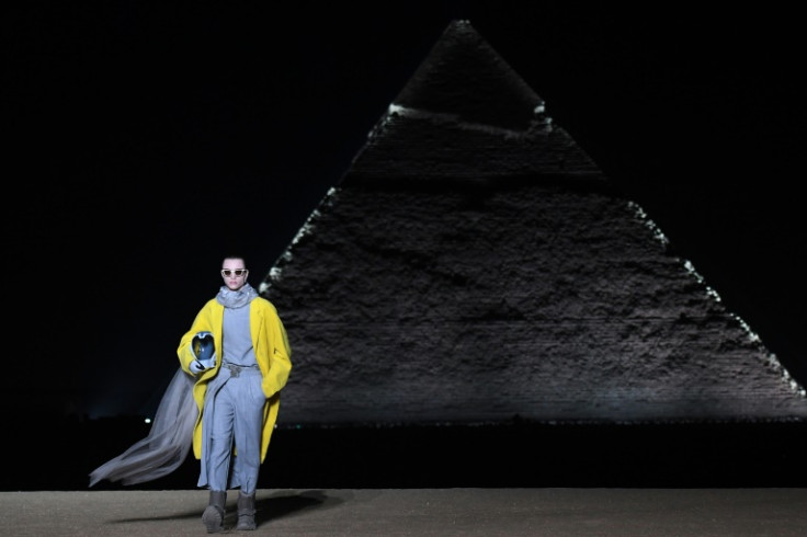 French fashion house Dior presented its 2023 fall men's collection in the shadow of Egypt's ancient Giza pyramids on Saturday