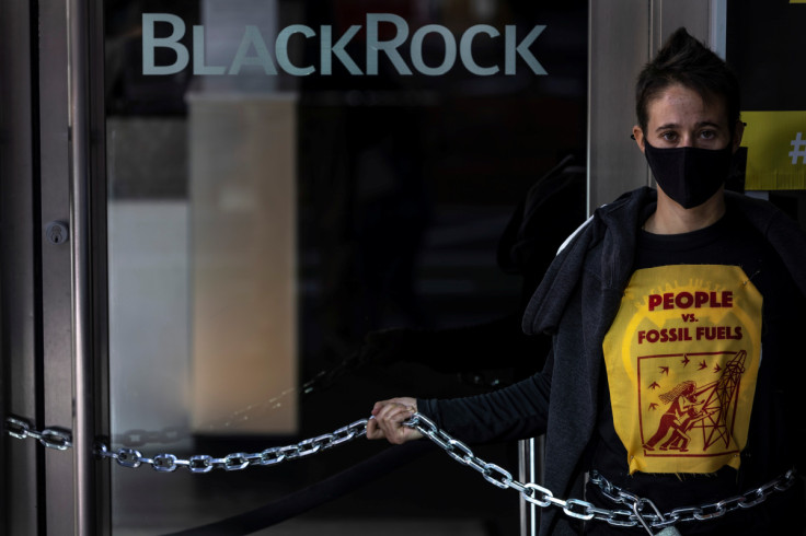 Climate change activists protest outside of BlackRock headquarters ahead of COP26, in San Francisco