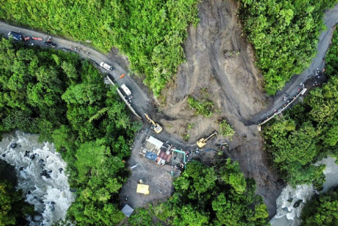 Aerial view of a landslide that engulfed a bus and other vehicles, killing 27 people in northwest Colombia