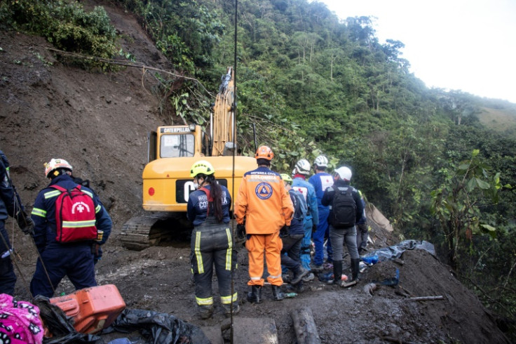 Rescue teams organize the search after a landslide in Pueblo Rico in northwestern Colombia