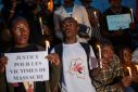 Congolese activists attend a vigil in memory of the civilians killed in the recent conflict between FARDC and rebel forces, in Goma