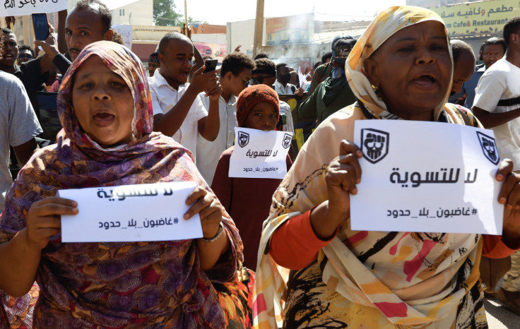 Protesters march during a rally against signed a framework deal in Khartoum