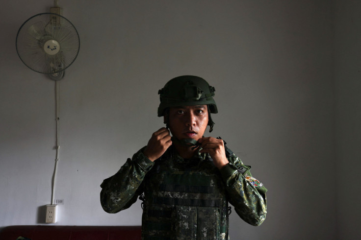 Hsu Shao-qiang, 29, a member of the Taiwan's Air Force "Tiger Band" attends his morning duty at the Chihhang Air Base in Taitung