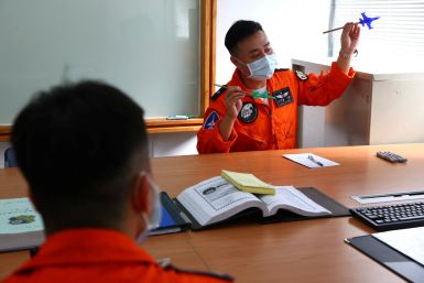 Chiang Chung-hao, 34, the lead singer of Taiwan's Air Force "Tiger Band" teaches students at Chihhang Air Base in Taitung