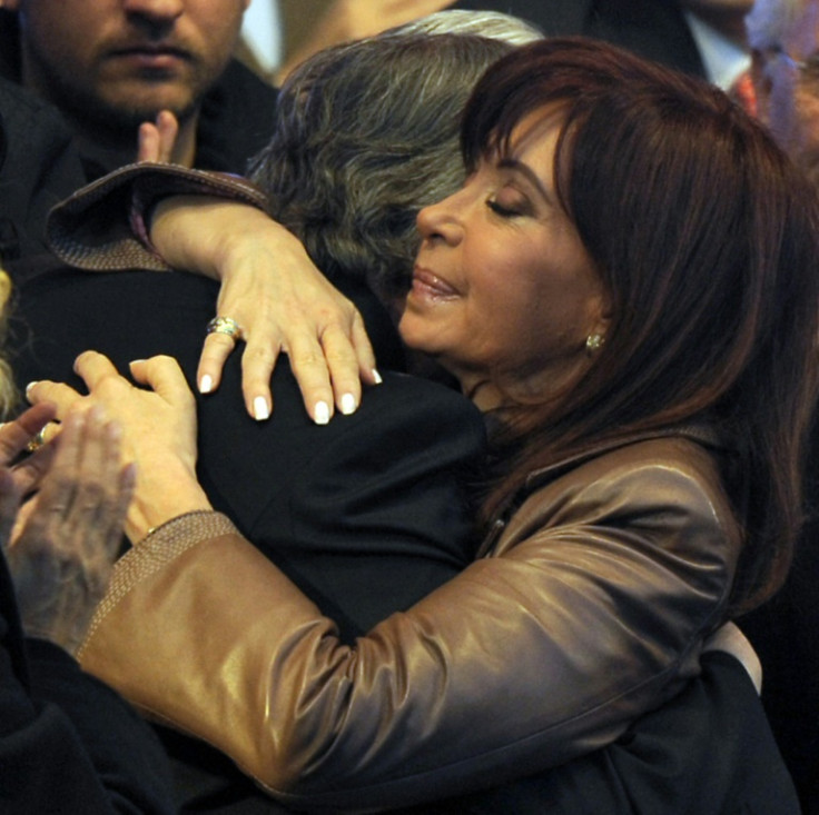 Argentina's Cristina Fernandez de Kirchner  embraces her late husband Nestor Kirchner, in 2009