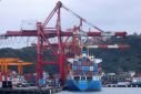 A cargo ship is pictured at a port, in Keelung