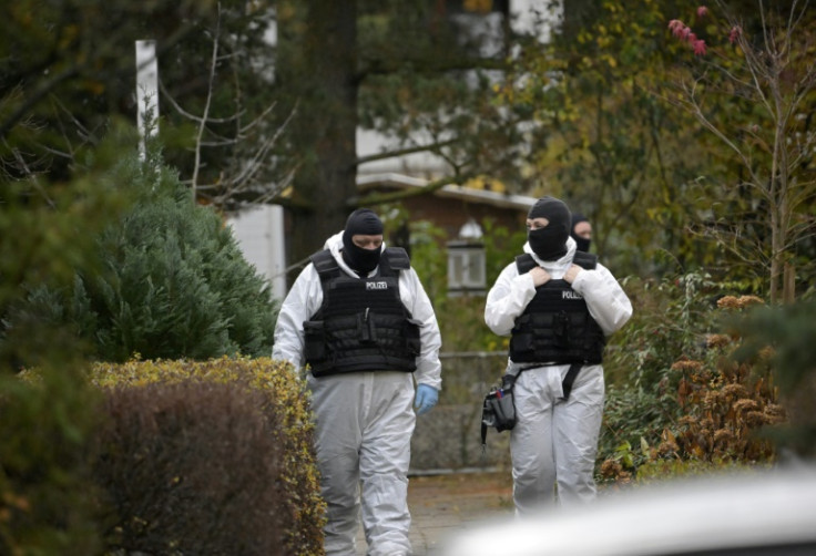 Around 3,000 officers including elite anti-terror units took part in the early morning raids