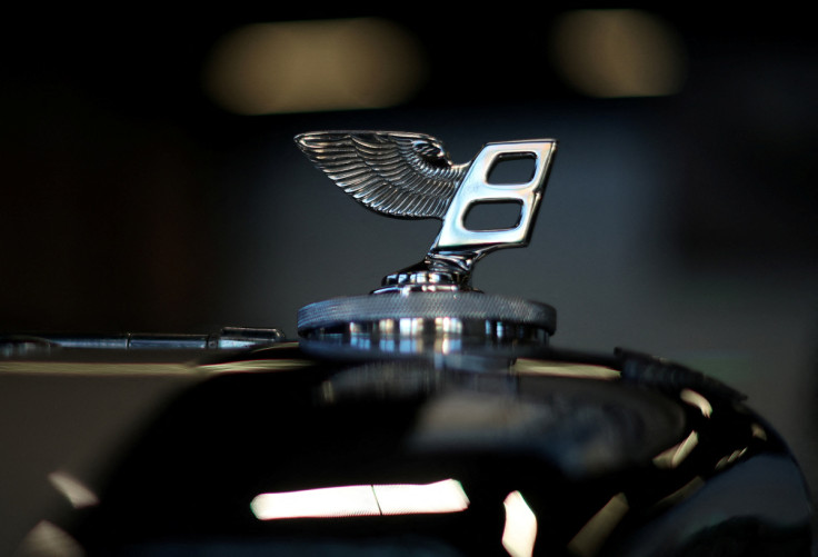 A company logo is seen on the bonnet of a classic car inside the heritage centre at the Bentley factory in Crewe
