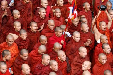 Monks march through Yangon city centre in an anti-government demonstration